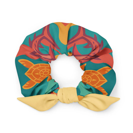 Colorful sustainable fashion scrunchie with turtle and floral design and tied bow detail